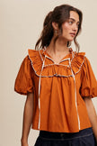 The Collier Ruffle Top
