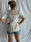 The Torin Embroidered Peplum Top