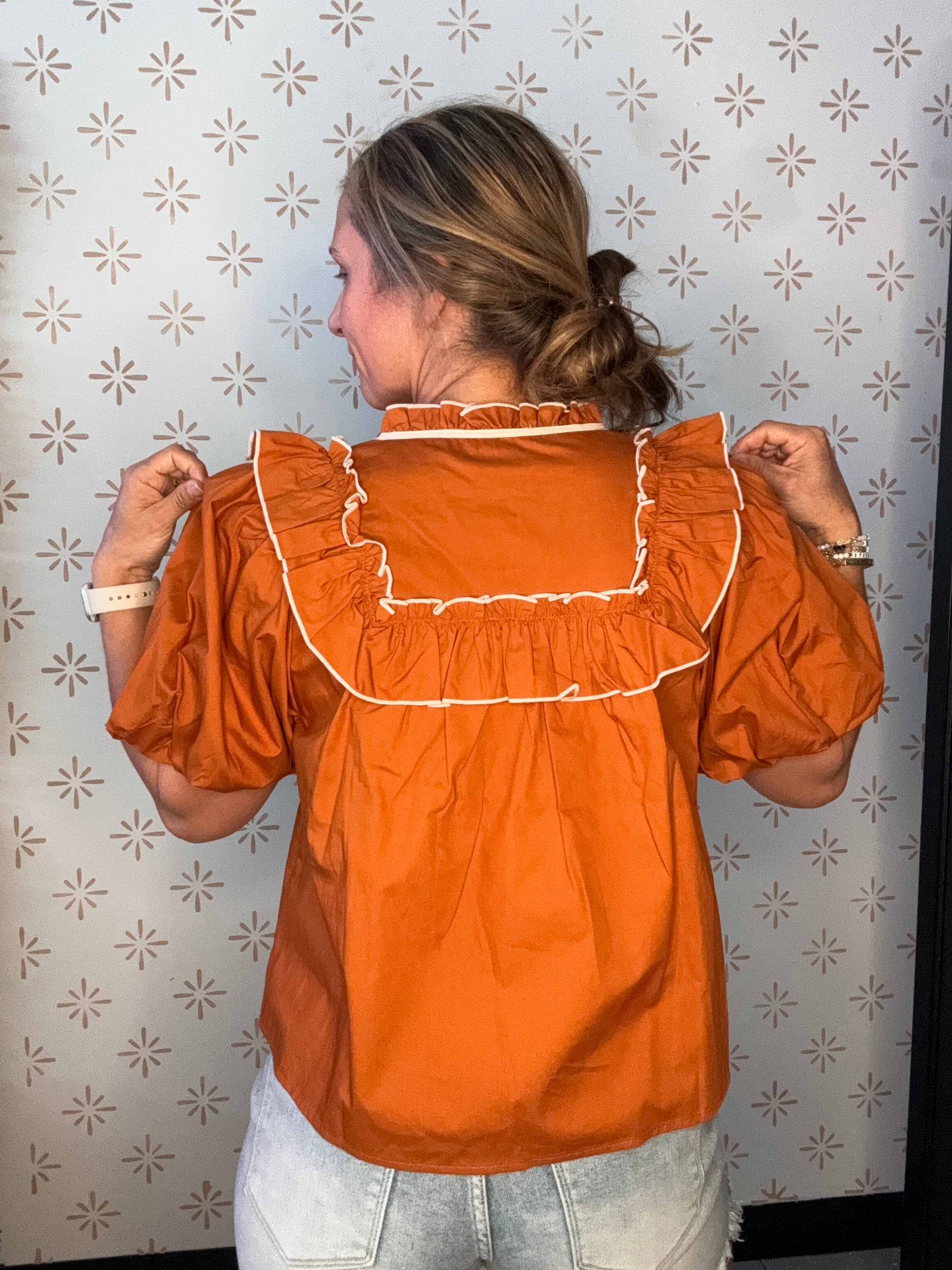 The Collier Ruffle Top