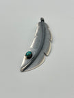 The Buckskin	Feather Pendant w/ Birdseye