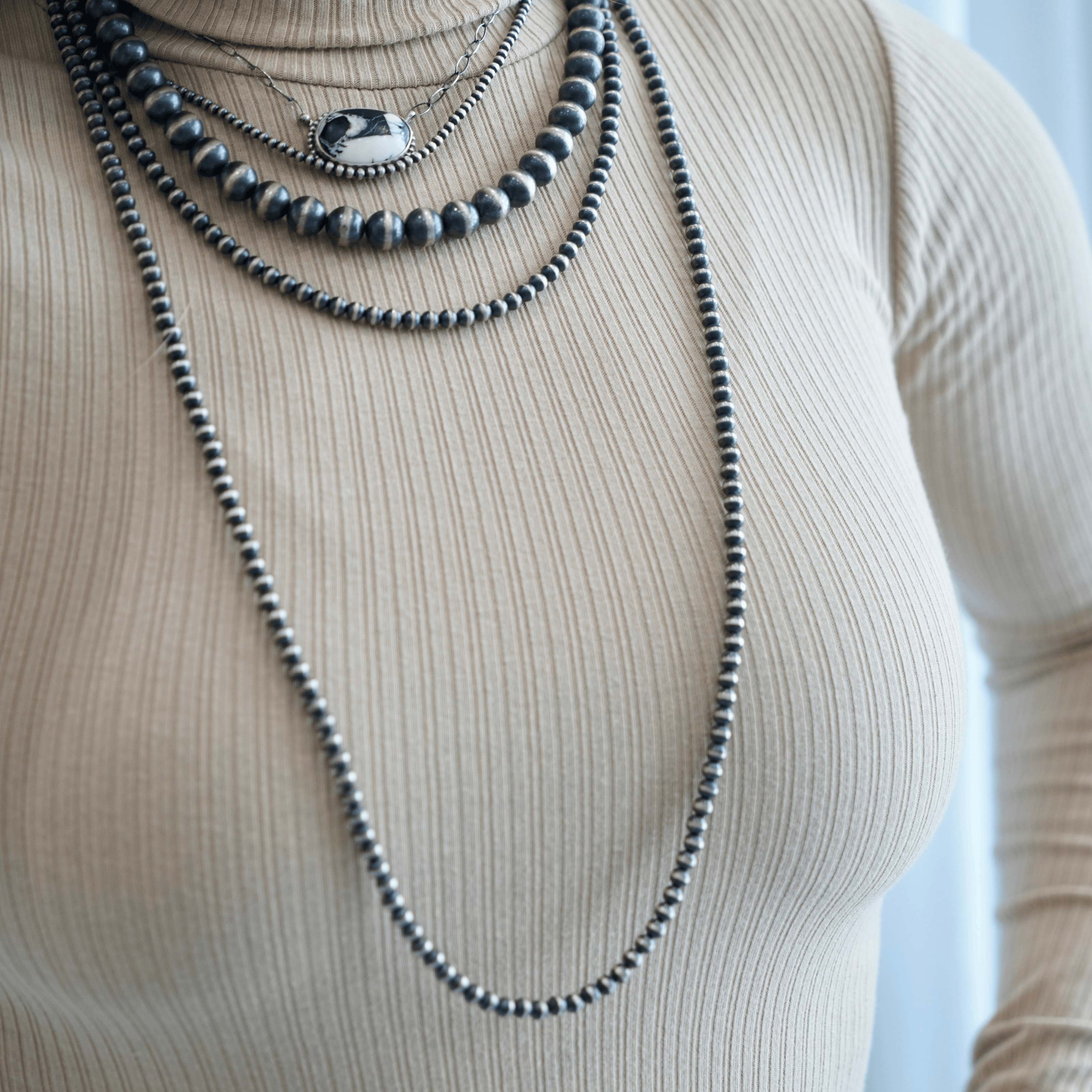 The MoJack Ribbed Turtleneck Bodysuit